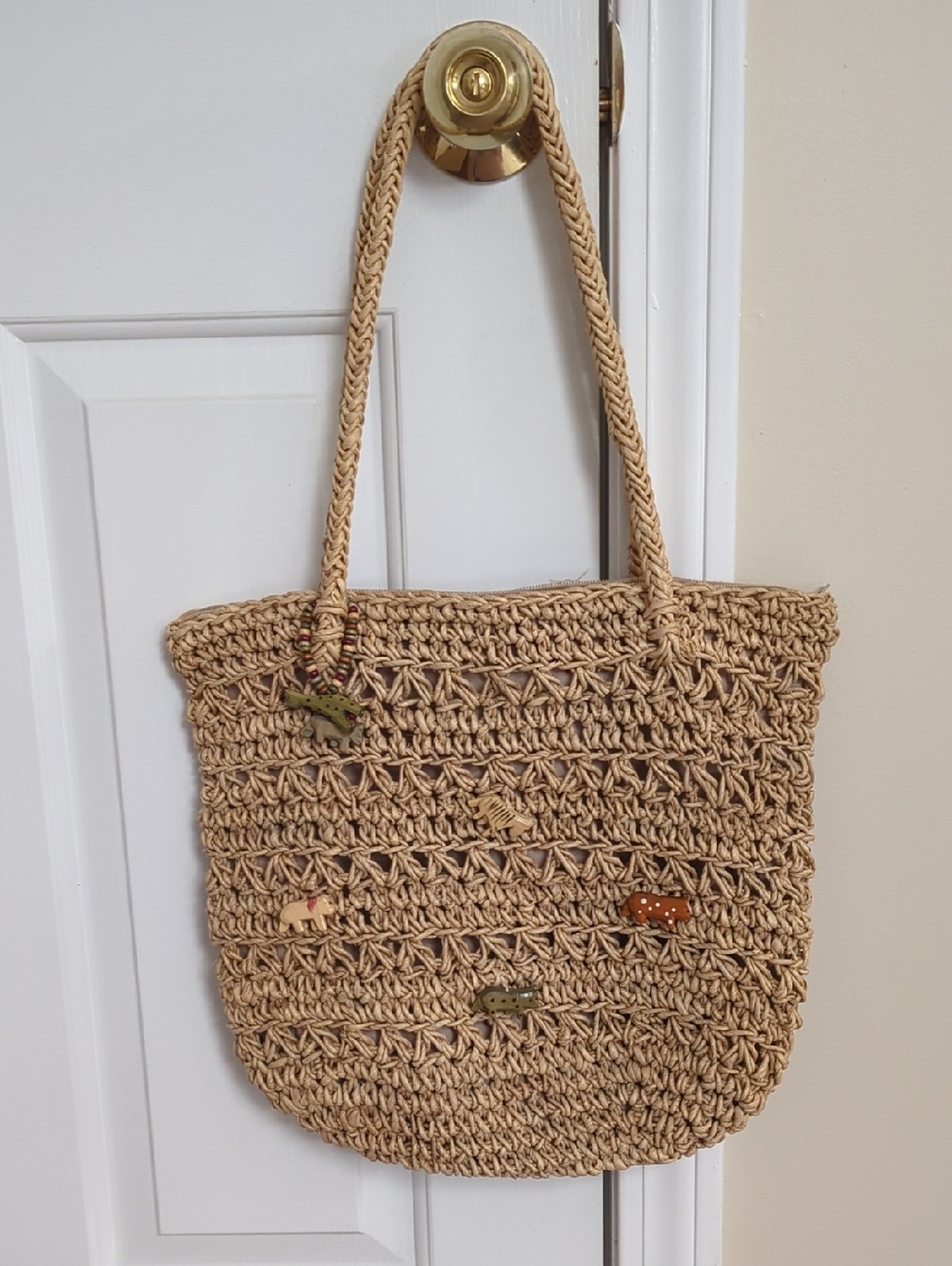 Woven Straw Tote Bag in Natural with Animal Appliques and Bag Charm